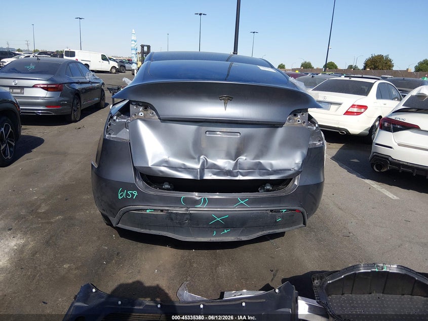 2023 Tesla Model y VIN 7SAYGDEE1PA166677 IAAI salvage auction — REAR END, Salvage Title, sold $10,300 on 2026-07-24 (photo 6)