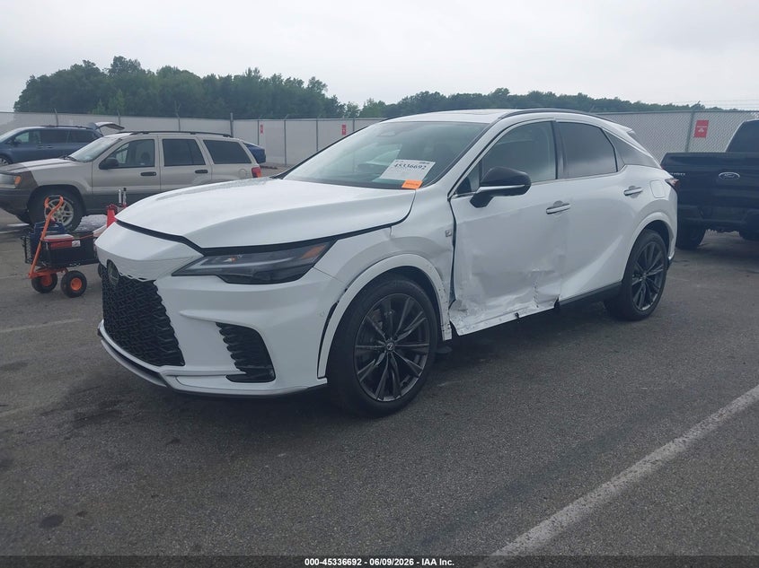 2026 Lexus Rx VIN 2T2BAMCA0TC138595 IAAI salvage auction — SIDE, Salvage Title, sold $29,500 on 2026-07-30 (photo 2)