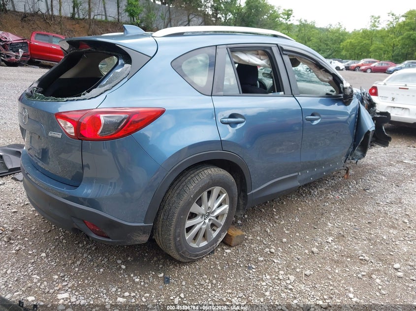 2014 Mazda Cx-5 VIN JM3KE4BE5E0422712 IAAI salvage auction — ROLLOVER, Salvage (Pennsylvania), sold $700 on 2026-07-14 (photo 4)