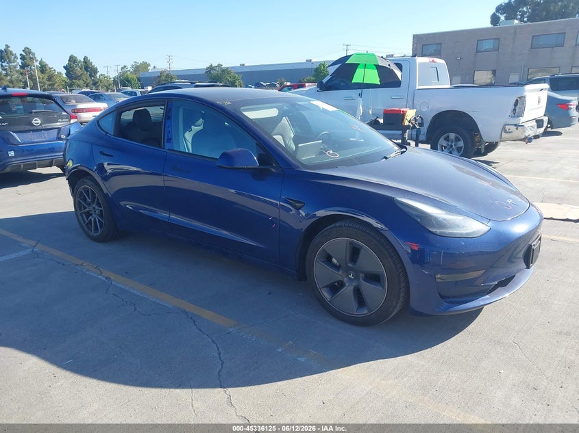 2022 Tesla Model 3 VIN 5YJ3E1EB3NF366381 — IAAI salvage auction photo