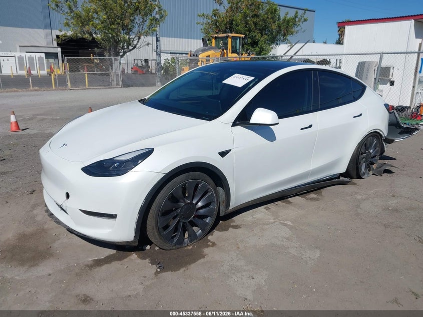 2023 Tesla Model y VIN 7SAYGDEF9PF636398 IAAI salvage auction — LEFT REAR, Wait Title, sold $9,100 on 2026-08-03 (photo 2)