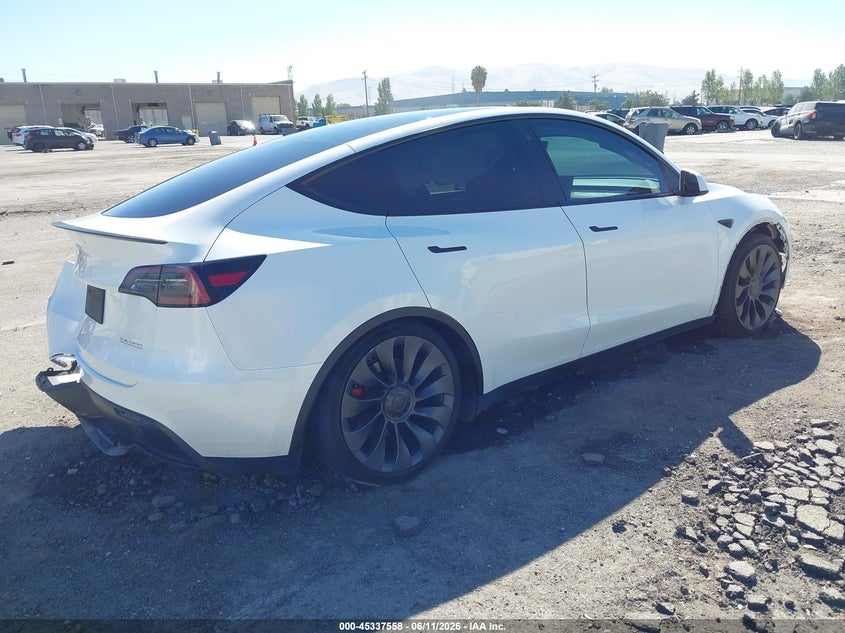 2023 Tesla Model y VIN 7SAYGDEF9PF636398 IAAI salvage auction — LEFT REAR, Wait Title, sold $9,100 on 2026-08-03 (photo 4)