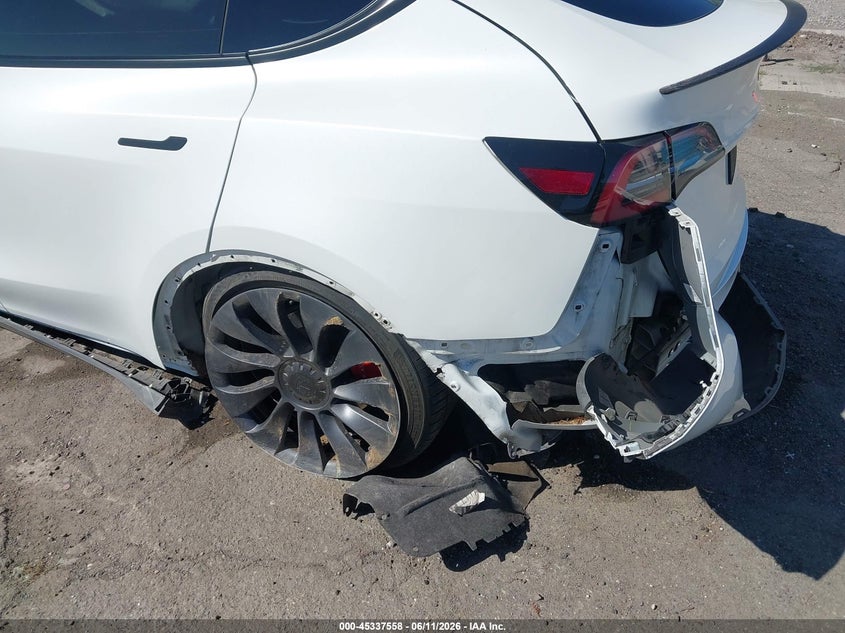 2023 Tesla Model y VIN 7SAYGDEF9PF636398 IAAI salvage auction — LEFT REAR, Wait Title, sold $9,100 on 2026-08-03 (photo 6)