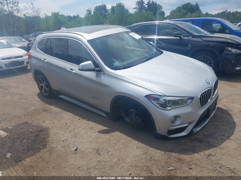 2018 BMW X1 VIN WBXHT3C3XJ5K23560 IAAI salvage auction — RIGHT FRONT, Salvage (Massachusetts), sold $4,050 on 2026-07-17 (photo 1)