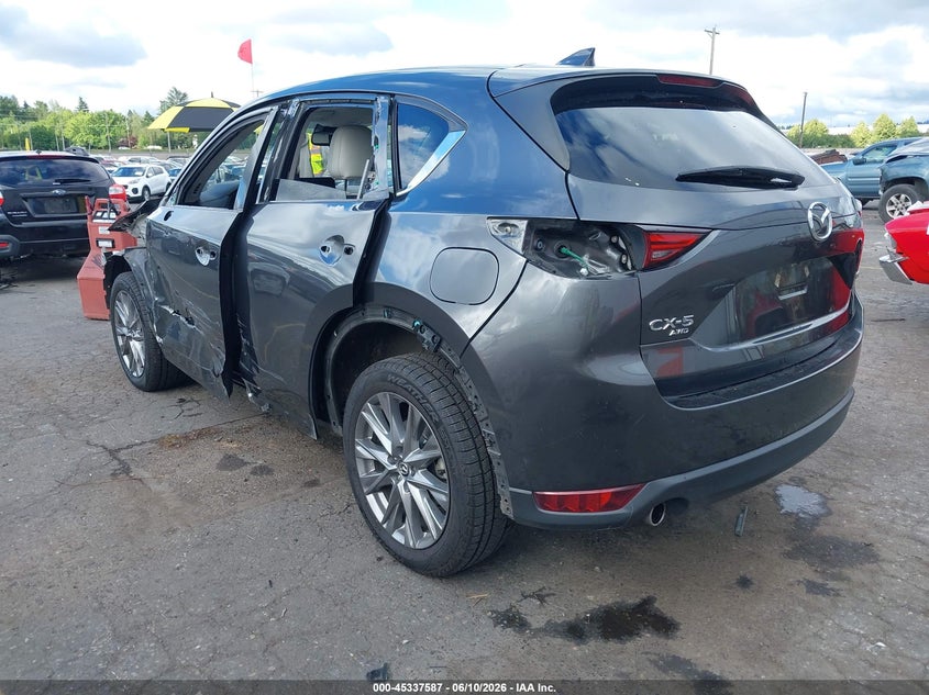 2021 Mazda Cx-5 VIN JM3KFBDM2M1499990 IAAI salvage auction — SIDE, Salvage (Oregon), sold $4,600 on 2026-07-23 (photo 3)