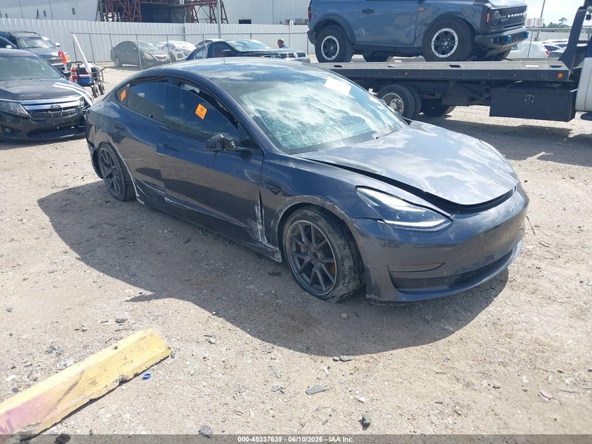 2021 Tesla Model 3 VIN 5YJ3E1EAXMF976378 IAAI salvage auction — SIDE, Salvage Title, sold $3,850 on 2026-08-30 (photo 1)