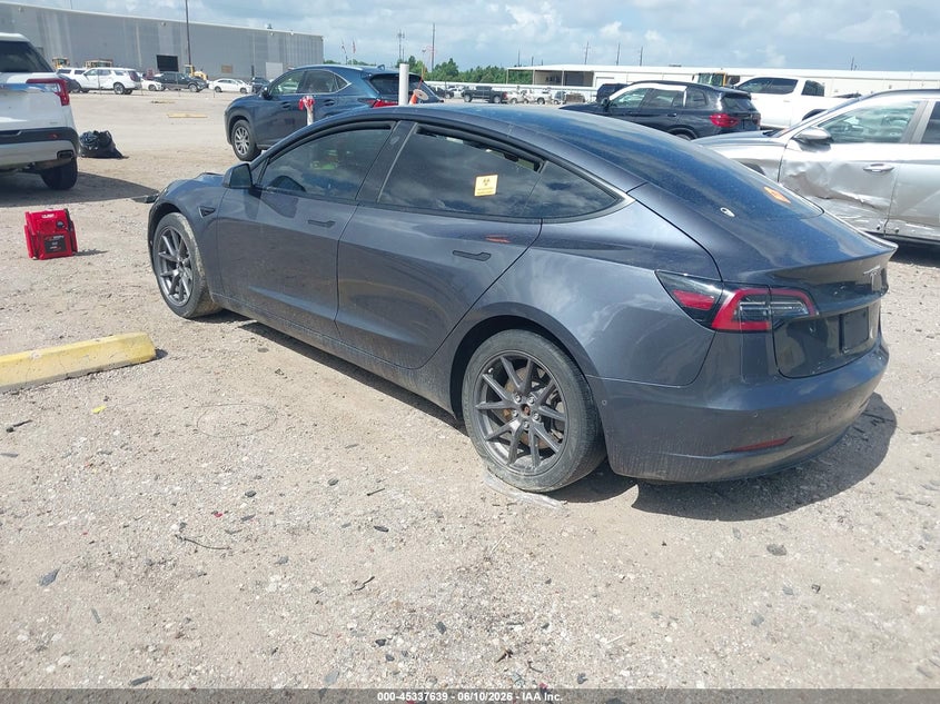 2021 Tesla Model 3 VIN 5YJ3E1EAXMF976378 IAAI salvage auction — SIDE, Salvage Title, sold $3,850 on 2026-08-30 (photo 3)