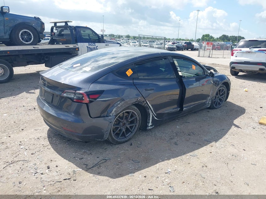 2021 Tesla Model 3 VIN 5YJ3E1EAXMF976378 IAAI salvage auction — SIDE, Salvage Title, sold $3,850 on 2026-08-30 (photo 4)