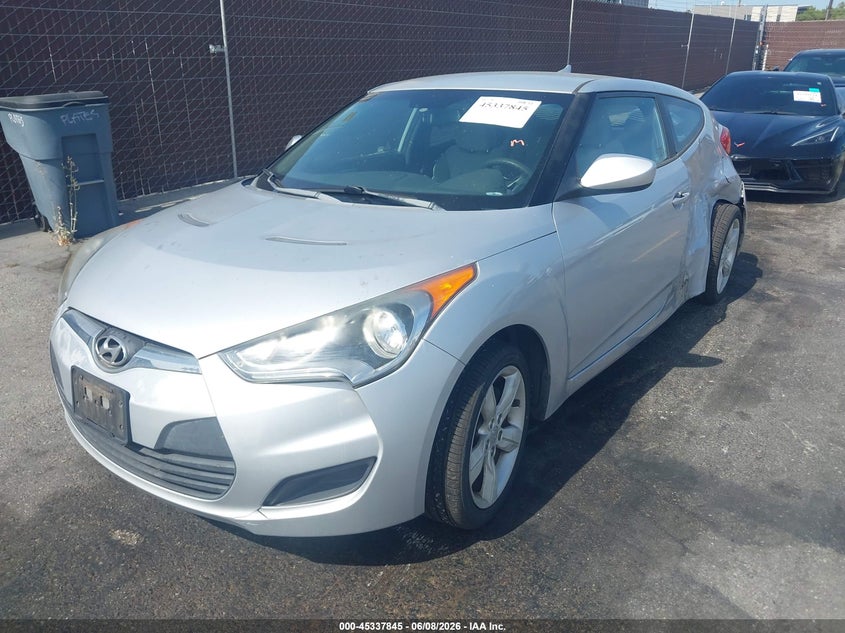 2012 Hyundai Veloster VIN KMHTC6AD5CU028443 IAAI salvage auction — SIDE, Wait Title, sold $425 on 2026-10-09 (photo 2)
