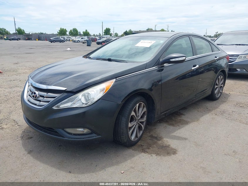2013 Hyundai Sonata VIN 5NPEC4AB9DH659577 IAAI salvage auction — NORMAL WEAR, Salvage Title, sold $450 on 2026-07-08 (photo 2)