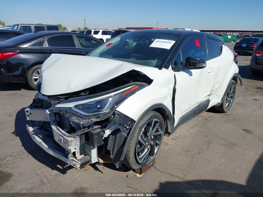 2021 Toyota C-hr VIN JTNKHMBX3M1107672 IAAI salvage auction — FRONT & REAR, Salvage (Arizona), sold $2,800 on 2026-07-14 (photo 2)