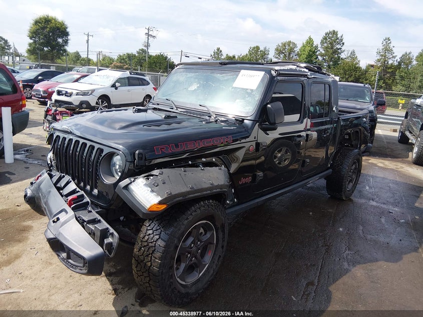2023 Jeep Gladiator VIN 1C6JJTBG0PL581349 IAAI salvage auction — ROLLOVER, Salvage Title, sold $12,475 on 2026-08-31 (photo 2)