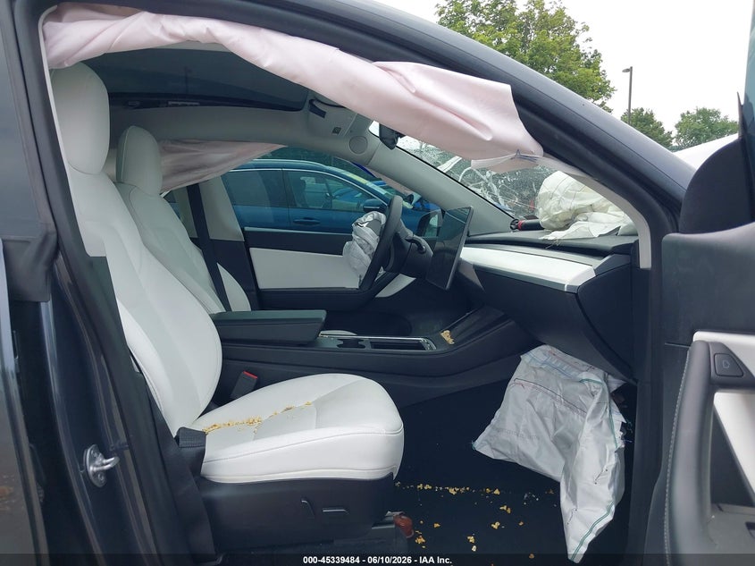 2022 Tesla Model y VIN 7SAYGDEE0NF457042 IAAI salvage auction — FRONT END, Salvage Title, sold $7,975 on 2026-09-03 (photo 5)