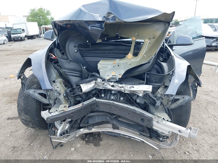 2022 Tesla Model y VIN 7SAYGDEE0NF457042 IAAI salvage auction — FRONT END, Salvage Title, sold $7,975 on 2026-09-03 (photo 6)