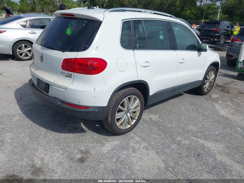 2015 Volkswagen Tiguan VIN WVGBV7AX6FW101849 IAAI salvage auction — NORMAL WEAR, Salvage Title, sold $925 on 2026-07-27 (photo 4)