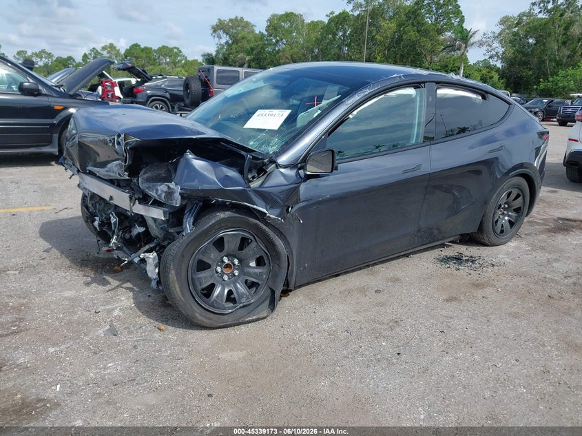 2026 Tesla Model y VIN 7SAYGDED0TA606146 IAAI salvage auction — FRONT END, Salvage (Arizona), sold $6,400 on 2026-07-30 (photo 2)