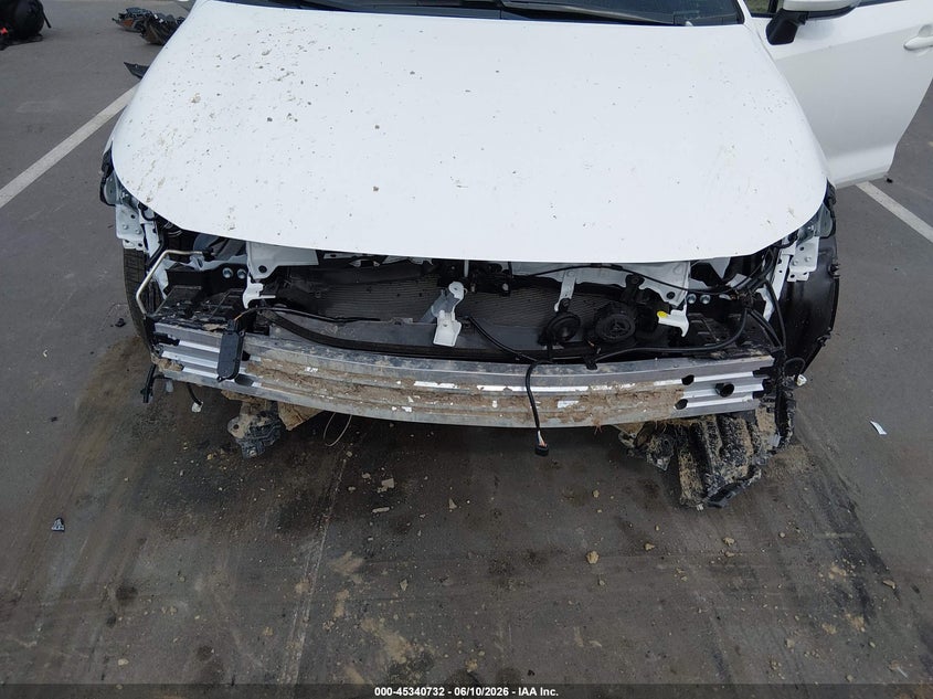 2026 Toyota Corolla VIN JTDBCMFE1T3131015 IAAI salvage auction — FRONT & REAR, Salvage Title, sold $8,100 on 2026-07-22 (photo 6)