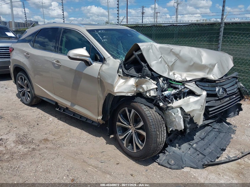 2016 Lexus Rx VIN 2T2ZZMCA6GC025313 IAAI salvage auction — FRONT & REAR, Salvage (Texas), sold $8,750 on 2026-08-24 (photo 1)