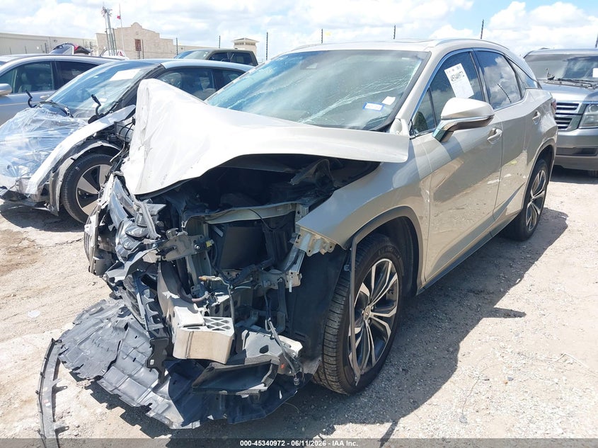 2016 Lexus Rx VIN 2T2ZZMCA6GC025313 IAAI salvage auction — FRONT & REAR, Salvage (Texas), sold $8,750 on 2026-08-24 (photo 2)