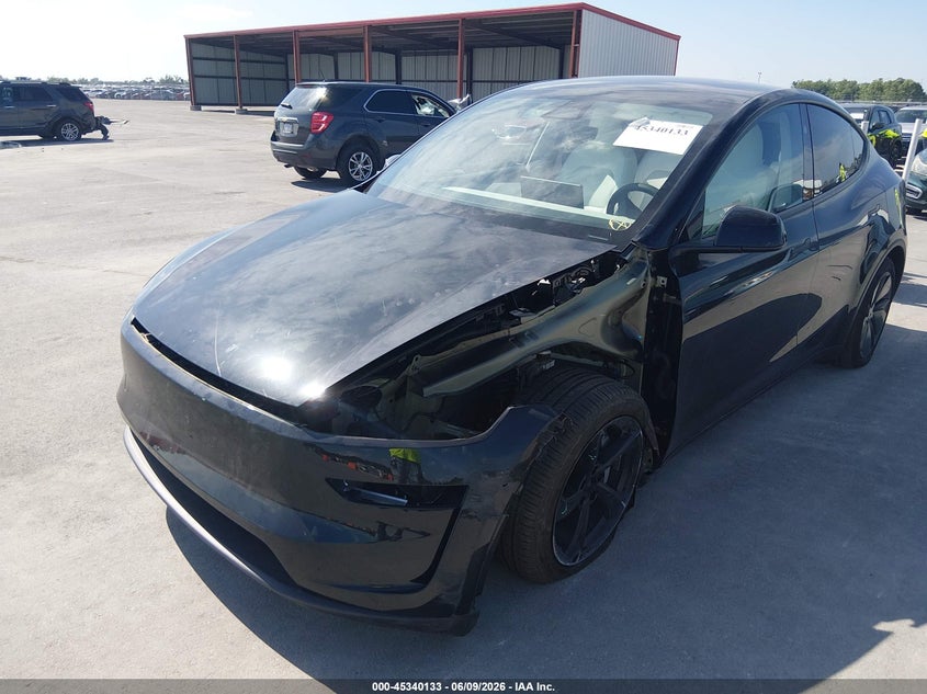 2026 Tesla Model y VIN 7SAYGDEE7TA622045 IAAI salvage auction — LEFT FRONT, Salvage (Illinois), sold $27,000 on 2026-07-23 (photo 6)