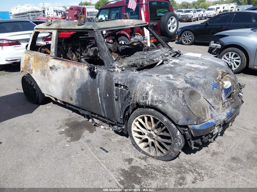 2005 Mini Cooper VIN WMWRE33475TD93493 IAAI salvage auction — BURN, Non-Repairable (Utah), sold $50 on 2026-07-30 (photo 1)