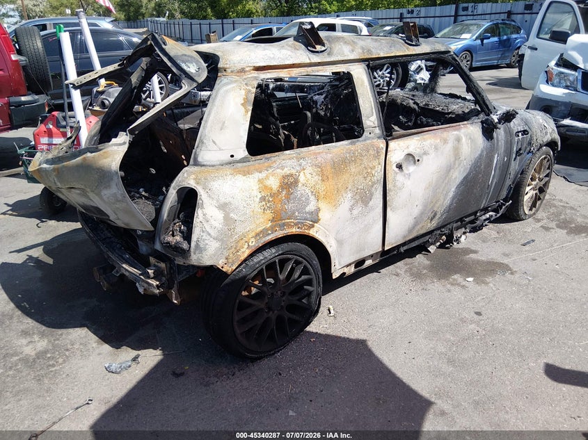 2005 Mini Cooper VIN WMWRE33475TD93493 IAAI salvage auction — BURN, Non-Repairable (Utah), sold $50 on 2026-07-30 (photo 4)