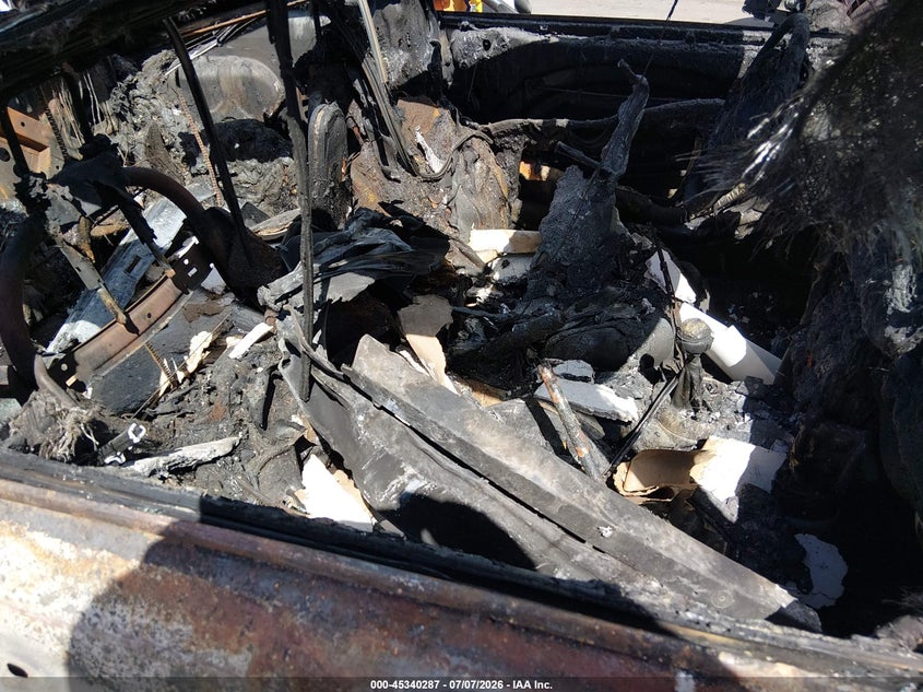 2005 Mini Cooper VIN WMWRE33475TD93493 IAAI salvage auction — BURN, Non-Repairable (Utah), sold $50 on 2026-07-30 (photo 5)