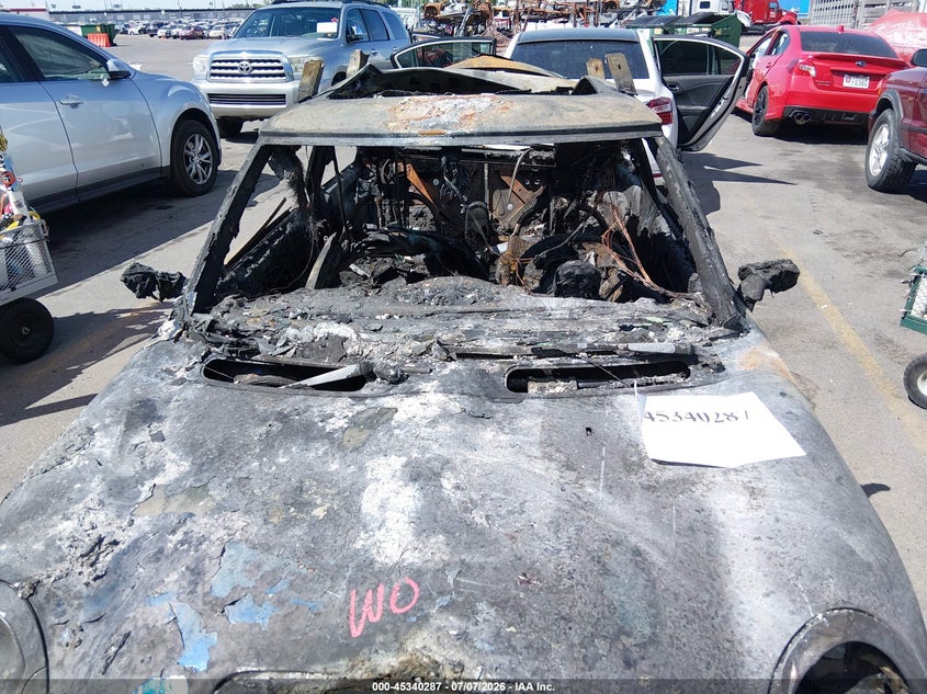 2005 Mini Cooper VIN WMWRE33475TD93493 IAAI salvage auction — BURN, Non-Repairable (Utah), sold $50 on 2026-07-30 (photo 6)
