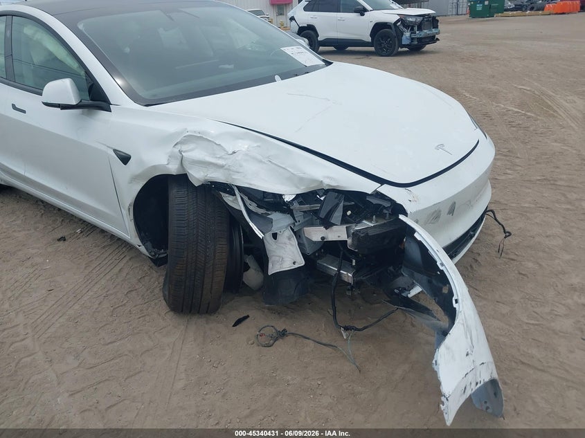 2025 Tesla Model 3 VIN 5YJ3E1EA3SF058646 IAAI salvage auction — FRONT END, Rebuildable (Florida), sold $10,250 on 2026-07-23 (photo 6)