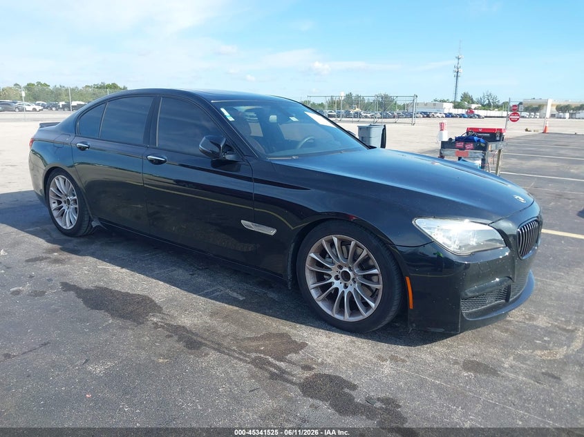 2015 BMW 7er VIN WBAYA6C5XFD827089 IAAI salvage auction — WATER/FLOOD, Rebuildable (Florida), sold $825 on 2026-07-16 (photo 1)
