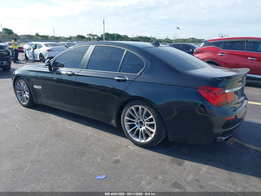 2015 BMW 7er VIN WBAYA6C5XFD827089 IAAI salvage auction — WATER/FLOOD, Rebuildable (Florida), sold $825 on 2026-07-16 (photo 3)