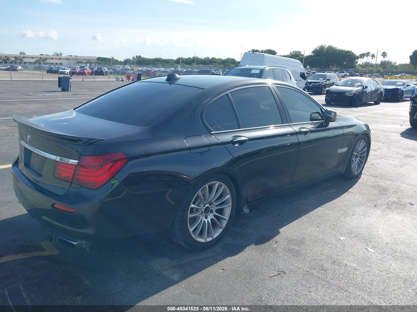 2015 BMW 7er VIN WBAYA6C5XFD827089 IAAI salvage auction — WATER/FLOOD, Rebuildable (Florida), sold $825 on 2026-07-16 (photo 4)