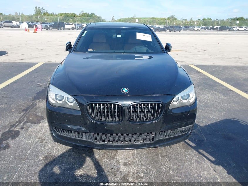 2015 BMW 7er VIN WBAYA6C5XFD827089 IAAI salvage auction — WATER/FLOOD, Rebuildable (Florida), sold $825 on 2026-07-16 (photo 6)