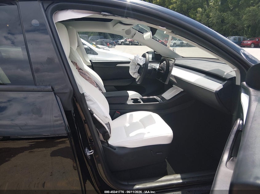 2023 Tesla Model y VIN 7SAYGDEDXPF941293 IAAI salvage auction — RIGHT SIDE, Salvage Title, sold $75 on 2026-07-29 (photo 5)