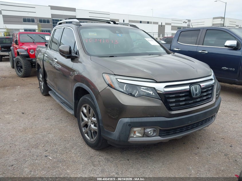 2020 Honda Ridgeline VIN 5FPYK3F77LB007169 — IAAI salvage auction photo