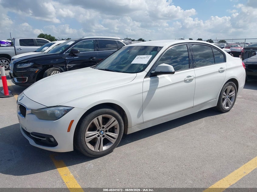 2016 BMW 3er VIN WBA8E9G57GNT43120 IAAI salvage auction — NORMAL WEAR, Salvage Title, sold $825 on 2026-07-09 (photo 2)