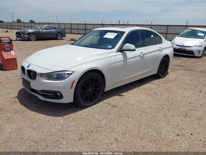 2018 BMW 3er VIN WBA8B9G57JNU57358 IAAI salvage auction — NORMAL WEAR, Original (Texas), sold $3,850 on 2026-07-13 (photo 2)
