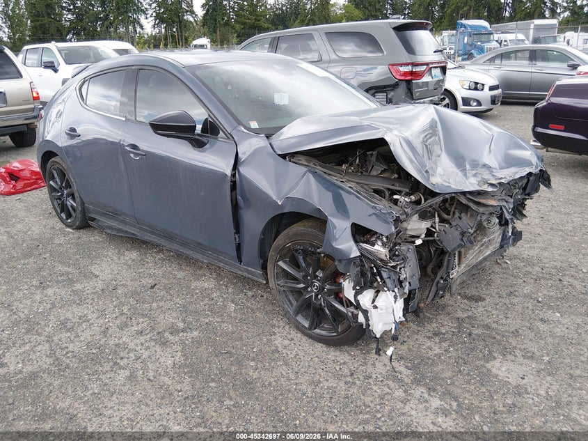 2021 Mazda 3 VIN JM1BPBNY7M1402824 IAAI salvage auction — NORMAL WEAR, Salvage Title, sold $2,025 on 2026-07-08 (photo 1)