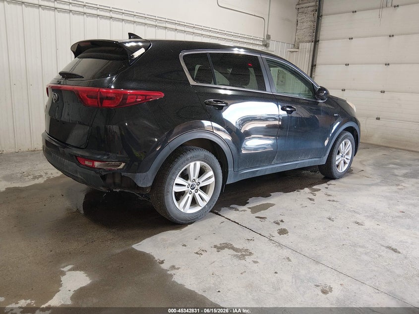2018 Kia Sportage VIN KNDPMCAC7J7301466 IAAI salvage auction — NORMAL WEAR, Original (Alaska), sold $1,025 on 2026-07-17 (photo 4)