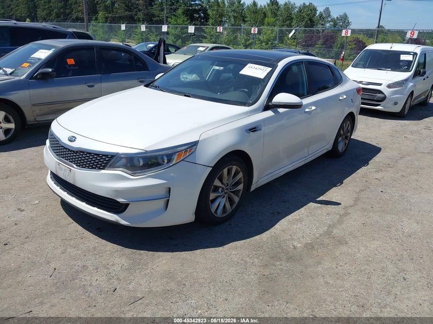 2016 Kia Optima VIN 5XXGU4L31GG029290 IAAI salvage auction — NORMAL WEAR, Rebuilt-Non-Public (Washington), sold $425 on 2026-07-15 (photo 2)