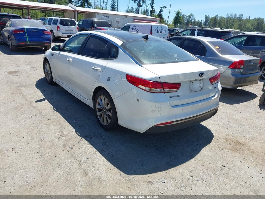 2016 Kia Optima VIN 5XXGU4L31GG029290 IAAI salvage auction — NORMAL WEAR, Rebuilt-Non-Public (Washington), sold $425 on 2026-07-15 (photo 3)