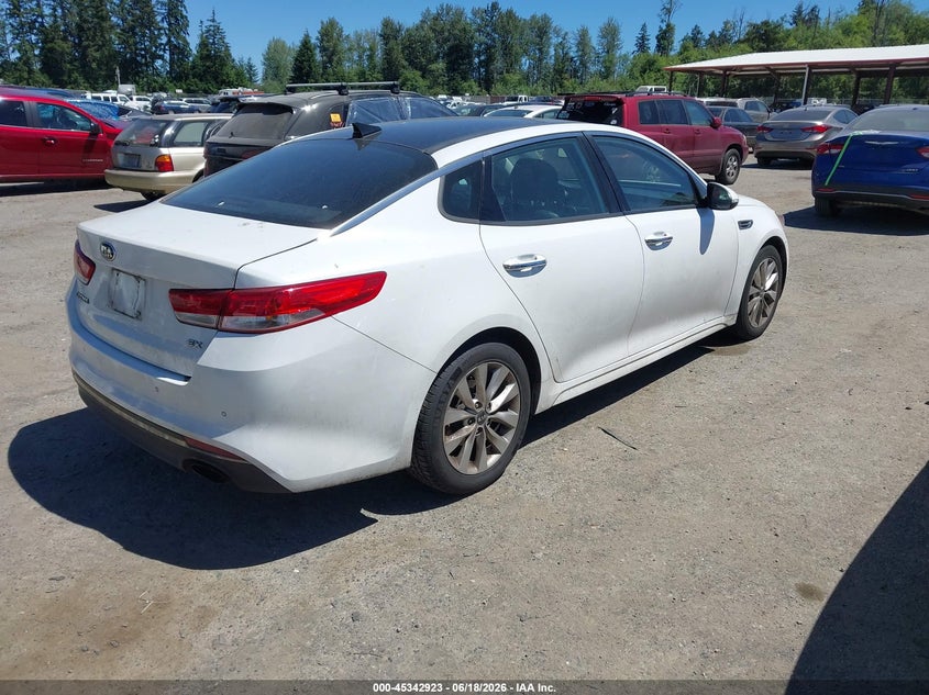 2016 Kia Optima VIN 5XXGU4L31GG029290 IAAI salvage auction — NORMAL WEAR, Rebuilt-Non-Public (Washington), sold $425 on 2026-07-15 (photo 4)