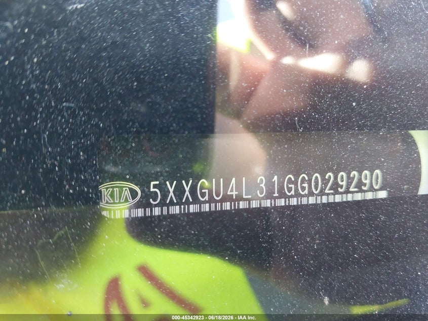 2016 Kia Optima VIN 5XXGU4L31GG029290 IAAI salvage auction — NORMAL WEAR, Rebuilt-Non-Public (Washington), sold $425 on 2026-07-15 (photo 9)