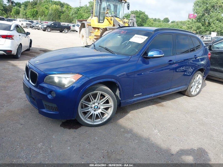 2014 BMW X1 VIN WBAVM1C53EVW47202 IAAI salvage auction — NORMAL WEAR, Clear - Public Restricted (Oklahoma), sold $325 on 2026-07-08 (photo 2)