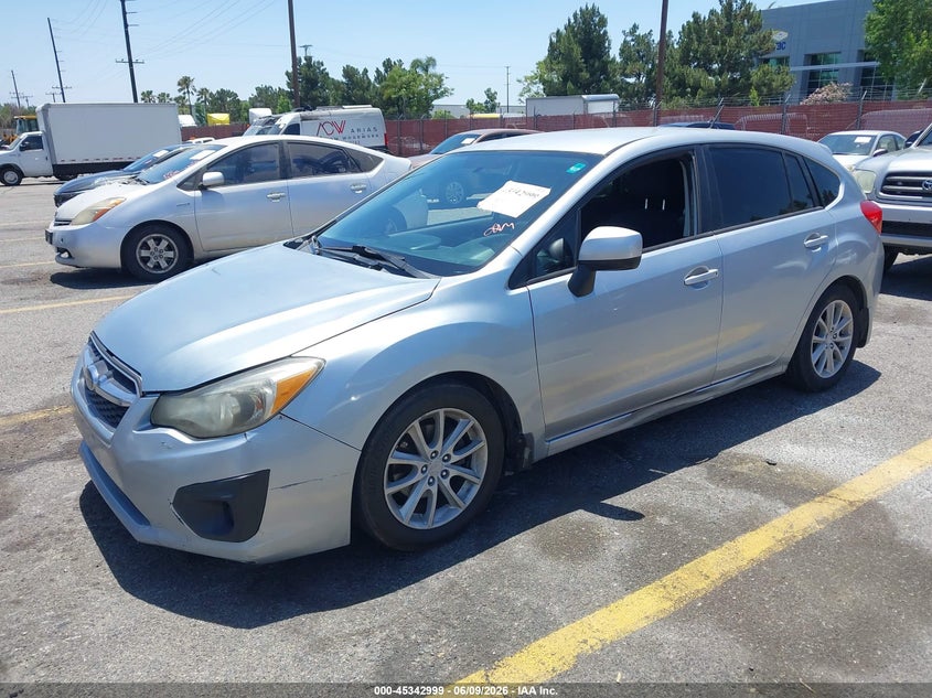 2013 Subaru Impreza VIN JF1GPAC65DH200627 IAAI salvage auction — NORMAL WEAR, Salvage Title, sold $600 on 2026-07-28 (photo 2)