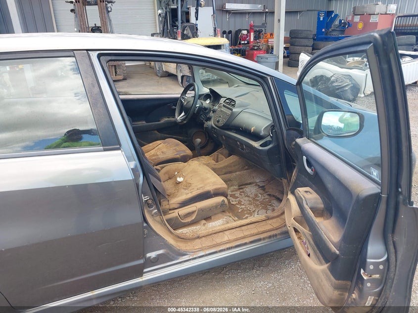 2012 Honda Fit VIN JHMGE8H55CC024519 IAAI salvage auction — WATER/FLOOD, Salvage Title, sold $100 on 2026-07-28 (photo 5)