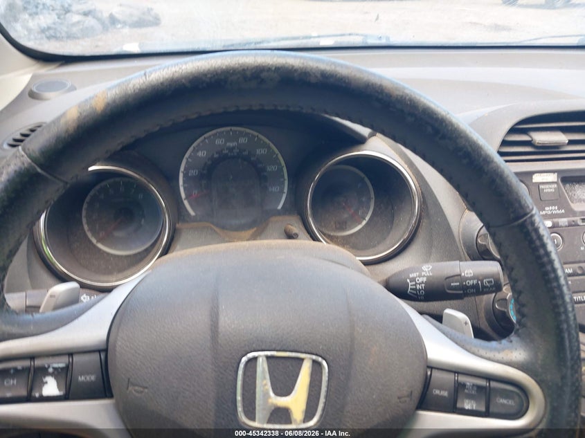 2012 Honda Fit VIN JHMGE8H55CC024519 IAAI salvage auction — WATER/FLOOD, Salvage Title, sold $100 on 2026-07-28 (photo 7)