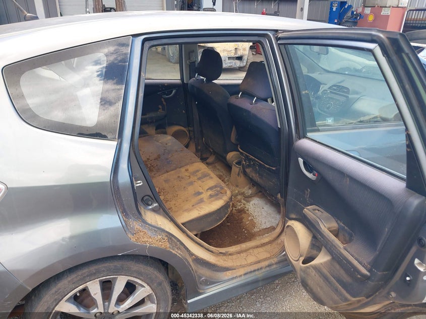 2012 Honda Fit VIN JHMGE8H55CC024519 IAAI salvage auction — WATER/FLOOD, Salvage Title, sold $100 on 2026-07-28 (photo 8)