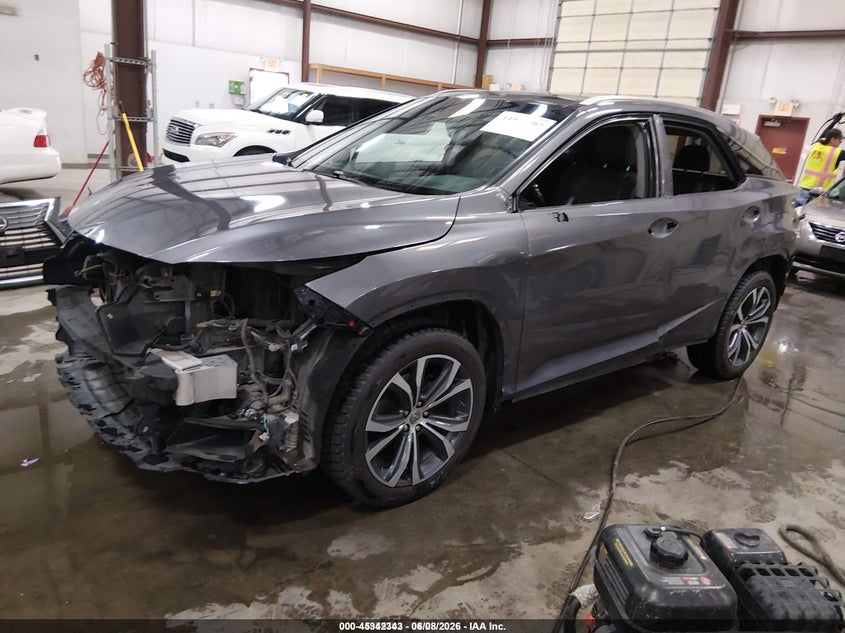 2016 Lexus Rx VIN 2T2BZMCA7GC023099 IAAI salvage auction — FRONT & REAR, Salvage (Idaho), sold $8,050 on 2026-09-04 (photo 2)