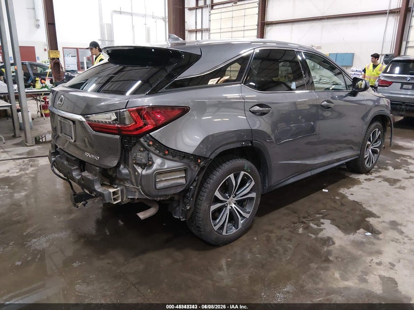 2016 Lexus Rx VIN 2T2BZMCA7GC023099 IAAI salvage auction — FRONT & REAR, Salvage (Idaho), sold $8,050 on 2026-09-04 (photo 4)